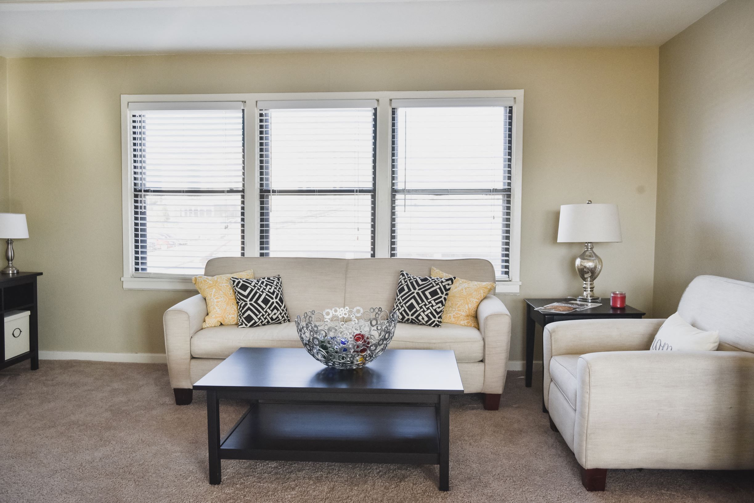 a living room with a couch and a coffee table